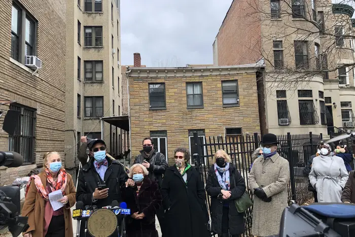 elected officials and activists gathered in Washington Heights last week to call for the landmarking of 875 Riverside Drive, which may or may not have been a stop on the Underground Railroad in the 1850s.